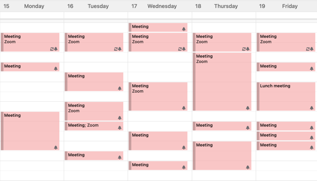 Online calendar of a work week with lots of meetings scheduled.