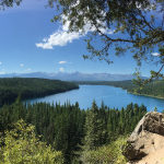 Are summers productive? Yes! Photo of Holland Lake, Montana on a clear summer day.