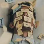 Nonprofits need anti-hustle productivity because we've all been disorganized, and this can help. A man covered in stick-notes, clearly overwhelemd.